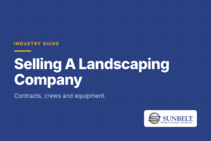 Landscaping crew servicing a commercial property, illustrating what buyers look for when selling a landscaping company
